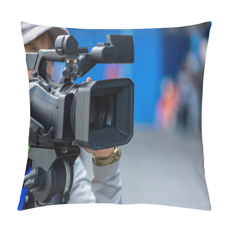 Personality  Video Camera Operator Working With His Equipment. Video Cinema Production. Covering An Event With A Video Camera. Professional Video Man Hand Holding Camera Operator Camcorder Working. Pillow Covers