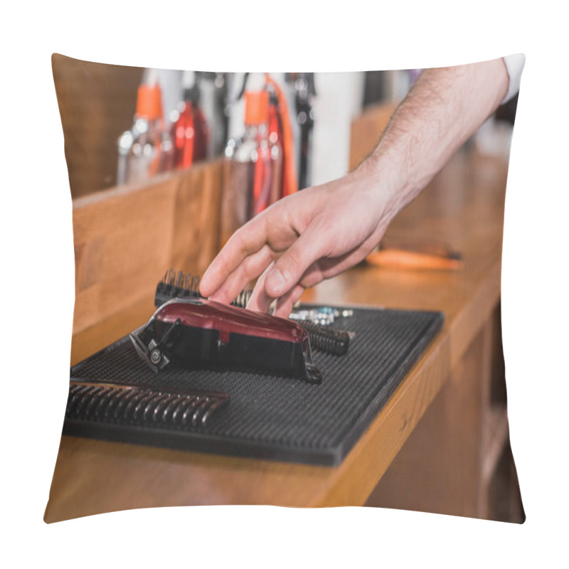 Personality  Cropped Shot Of Barber Choosing Tools From Rubber Mat At Workplace Pillow Covers