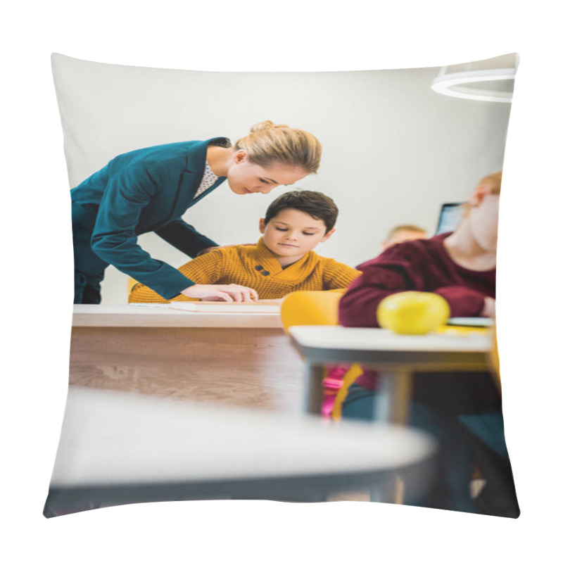 Personality  Young Female Teacher Helping Schoolchildren Studying At Desks  Pillow Covers