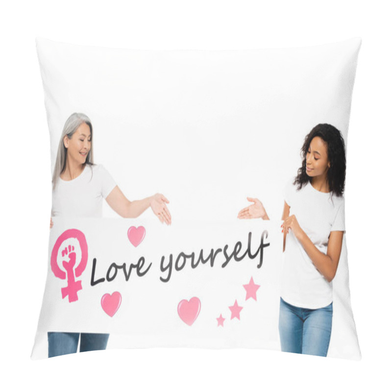 Personality  Happy African American And Asian Women Pointing With Hands At Placard With Love Yourself Lettering Isolated On White  Pillow Covers