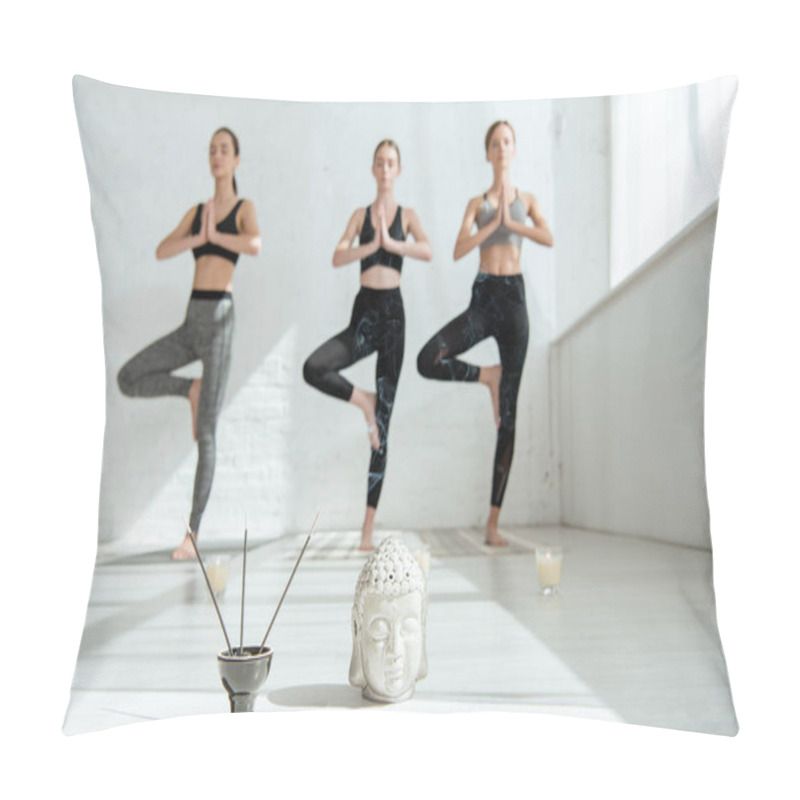 Personality  Selective Focus Of Buddha Head Sculpture, Incense Sticks, And Three Women Standing In Tree Pose  Pillow Covers