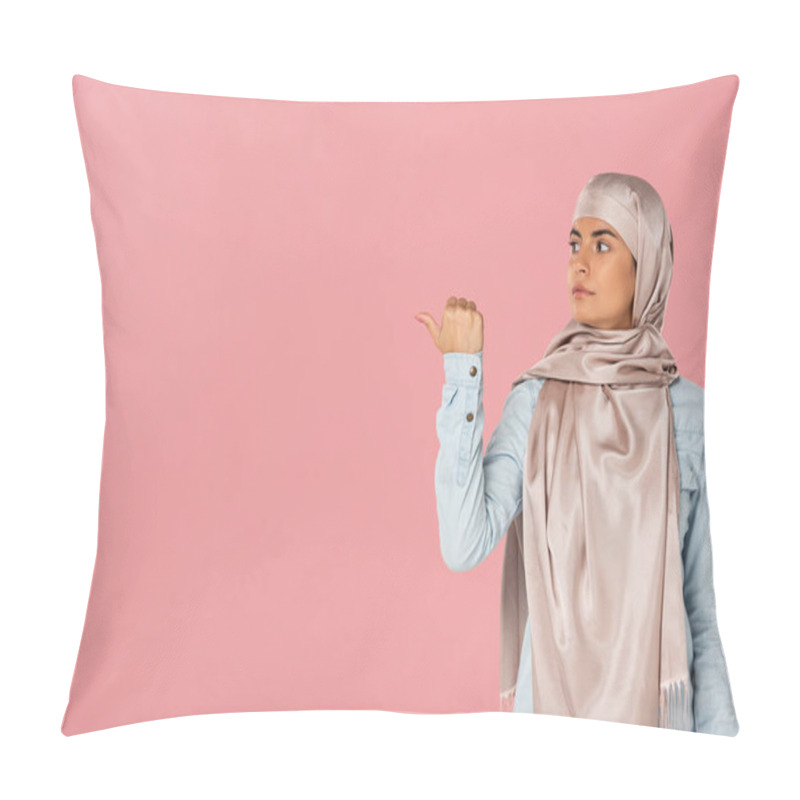 Personality  Muslim Girl In Hijab Showing Something With Thumb, Isolated On Pink Pillow Covers