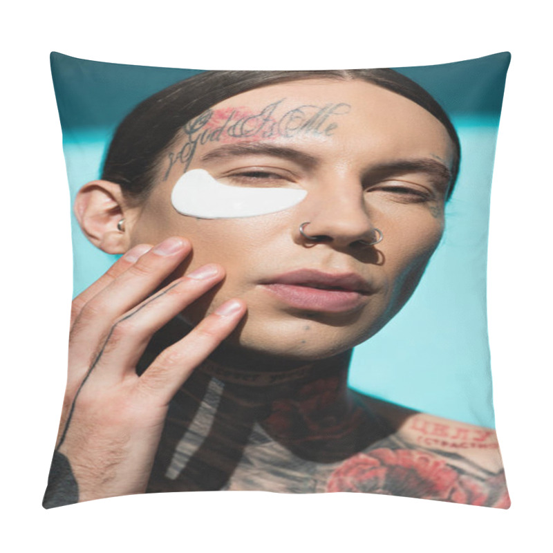 Personality  Tattooed Young Man Applying Eye Patch And Looking At Camera On Turquoise Pillow Covers