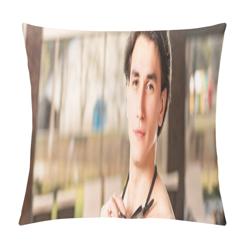 Personality  Panoramic Shot Of Handsome Man Holding Swimming Googles And Looking At Camera Pillow Covers