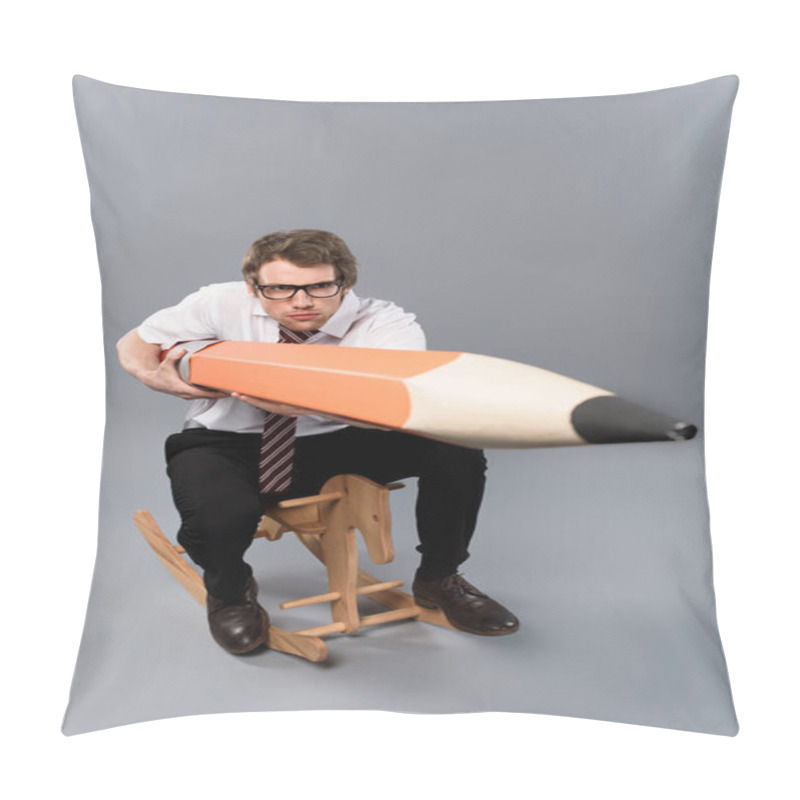 Personality  Funny Focused Business Man In Glasses Holding Huge Decorative Pencil While Riding Rocking Horse On Grey Background Pillow Covers