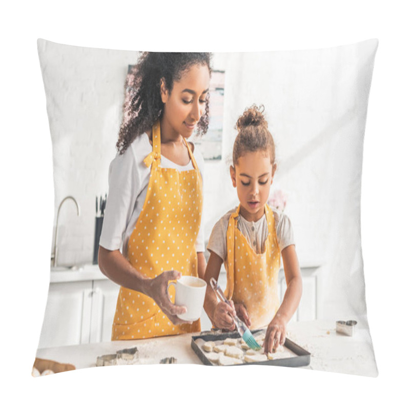 Personality  African American Mother And Daughter In Yellow Aprons Applying Oil On Unbaked Cookies In Kitchen Pillow Covers