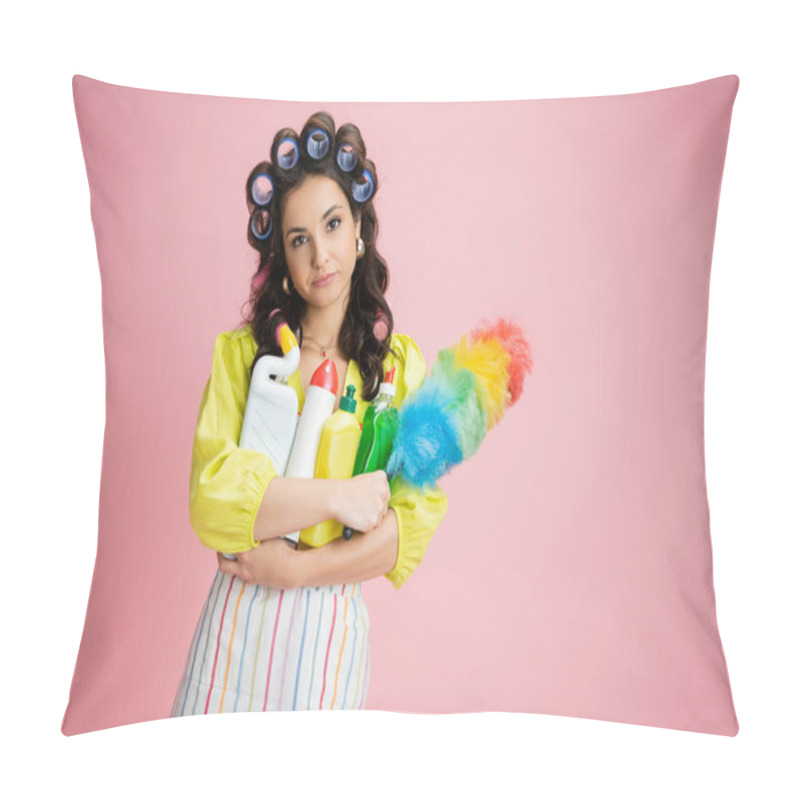 Personality  Bored Housewife With Hair Curlers And Different Cleaning Supplies Looking At Camera Isolated On Pink Pillow Covers