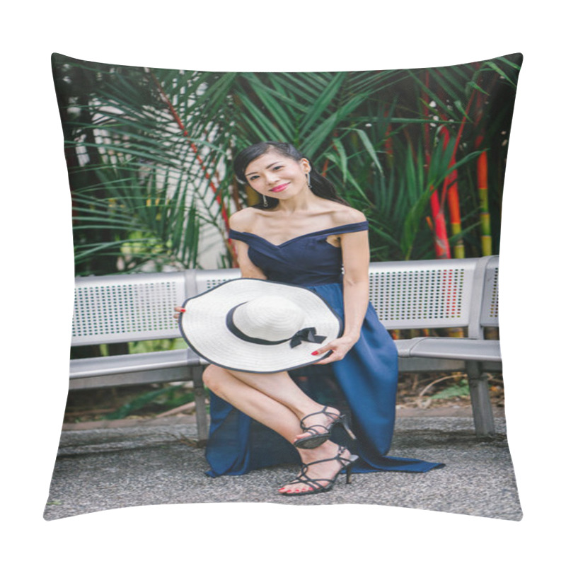 Personality  Portrait Of Asian Chinese Woman In An Elegant Blue Dress Posing With A White Broad-brimmed Hat During The Day In A Park In Asia. Pillow Covers