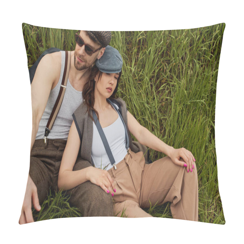 Personality  High Angle View Of Fashionable Brunette Woman In Newsboy Cap And Suspenders Sitting Next To Bearded Boyfriend In Sunglasses On Grassy Hill, Fashionable Couple Surrounded By Nature, Romantic Getaway Pillow Covers