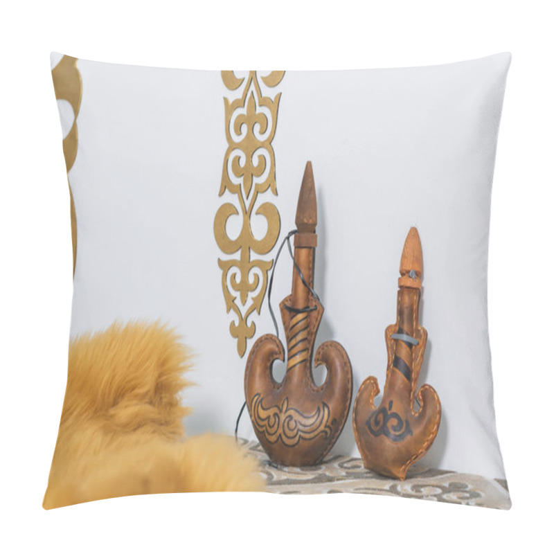 Personality  Kazakh National Subjects. Gold Ornaments On The White Walls. Sheep Skin Decorative.  Leather Container For Storing Drinks. Kazakh Medieval Shield. Wooden Chest With Patterns. Pillow Covers