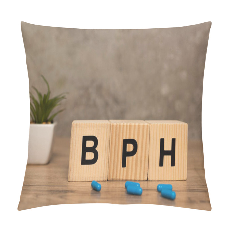 Personality  Selective Focus Of Cubes With Bph Letters And Pills With Plant On Wooden Table On Grey Background Pillow Covers