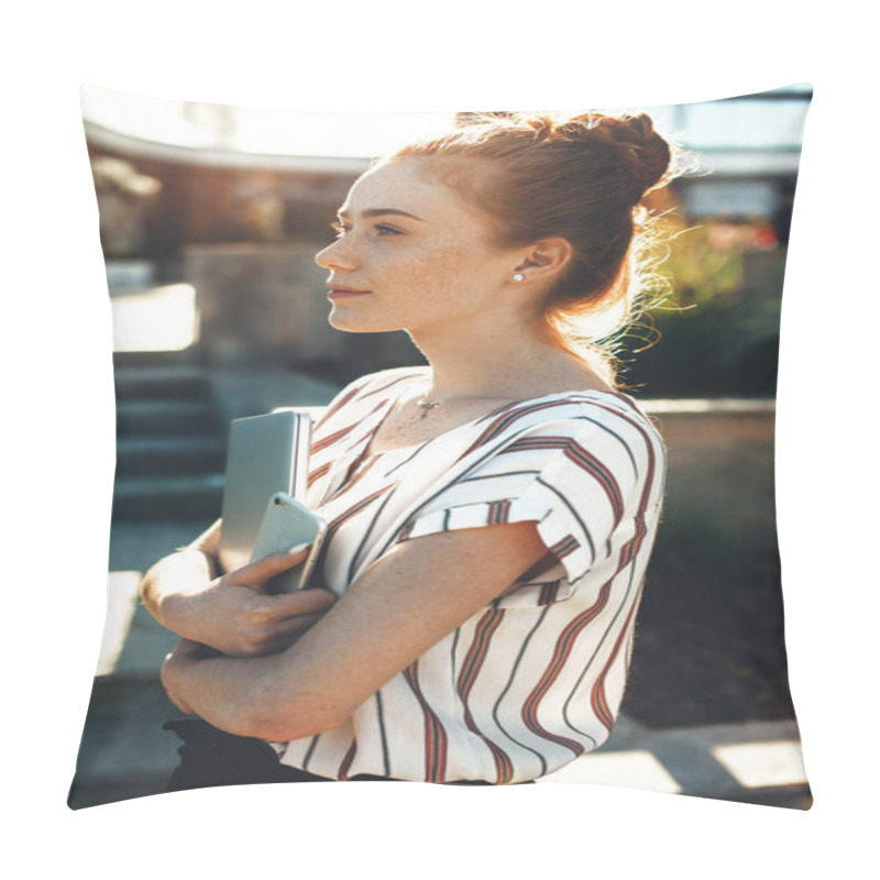 Personality  Lateral View Of A Ginger Caucasian Girl With Freckles Looking Away While Holding Her Laptop And Phone Pillow Covers