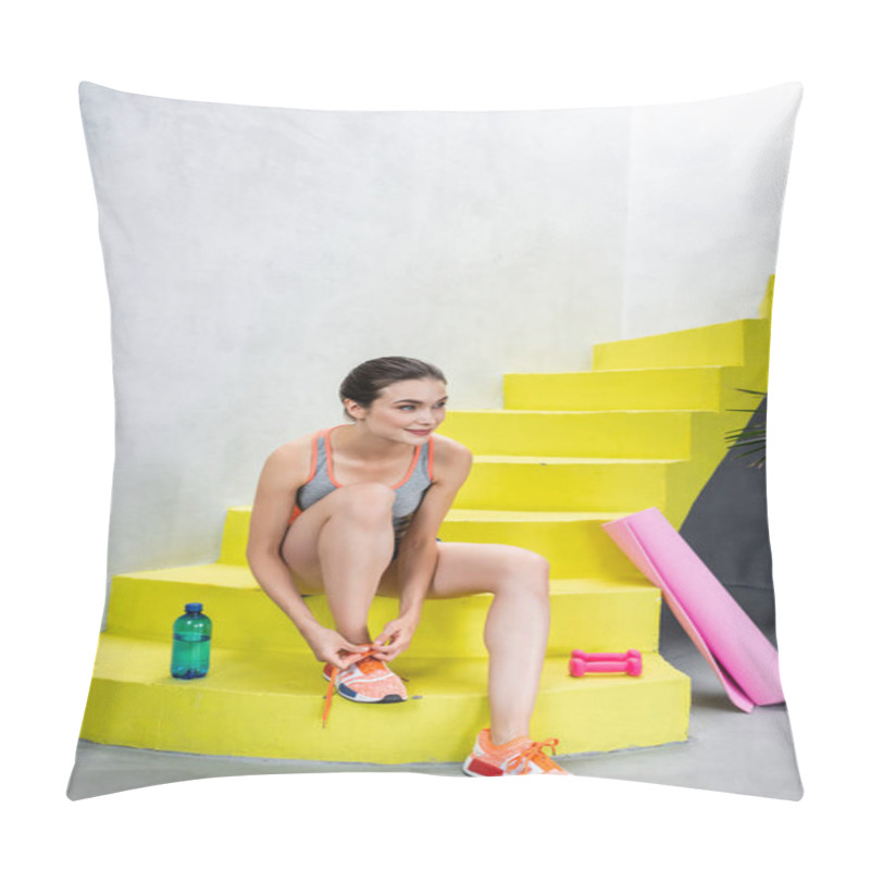 Personality  Selective Focus Of Sportswoman Tying Lace On Sneaker Near Bottle Of Water And Sport Equipment On Stairs At Home  Pillow Covers