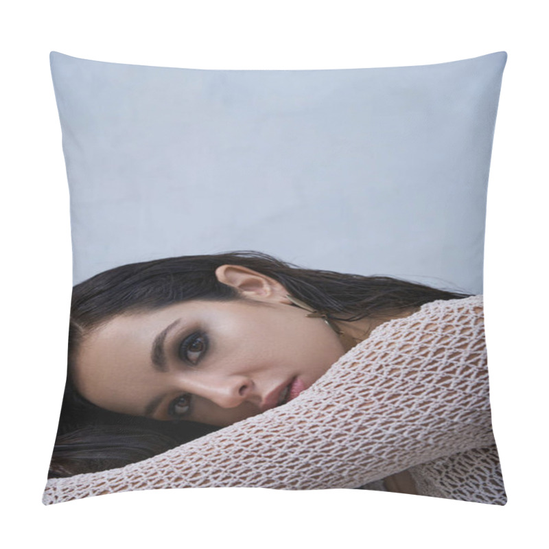 Personality  A Young Woman With Dark Hair And A Tanned Complexion Poses In A White Knitted Top, Showcasing Summer Fashion Trends In A Studio Setting. Pillow Covers