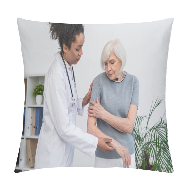 Personality  Senior Patient Touching Arm Near African American Traumatologist In Clinic  Pillow Covers