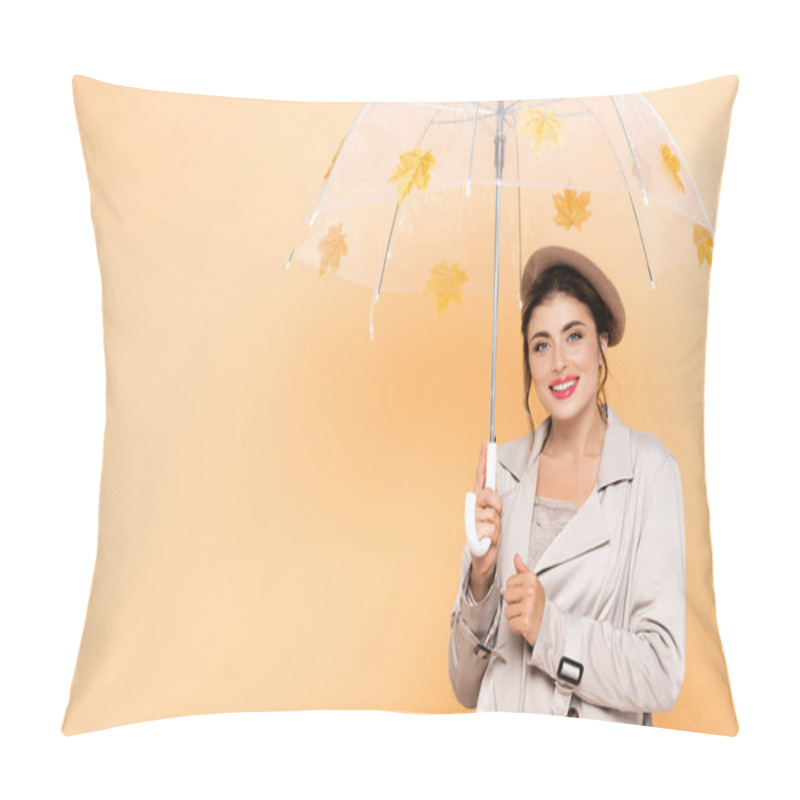 Personality  Stylish Woman In Beret And Trench Coat Looking At Camera Under Umbrella With Autumn Leaves On Peach Pillow Covers