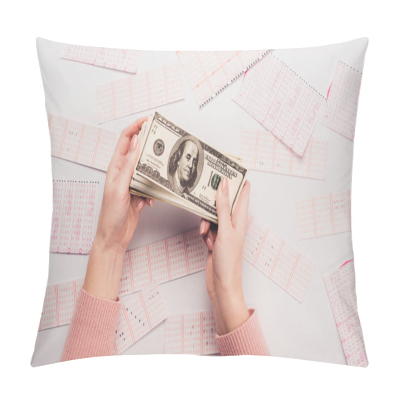 Personality  Cropped View Of Woman Holding Dollar Banknotes Near Scattered Lottery Tickets On White Table Pillow Covers