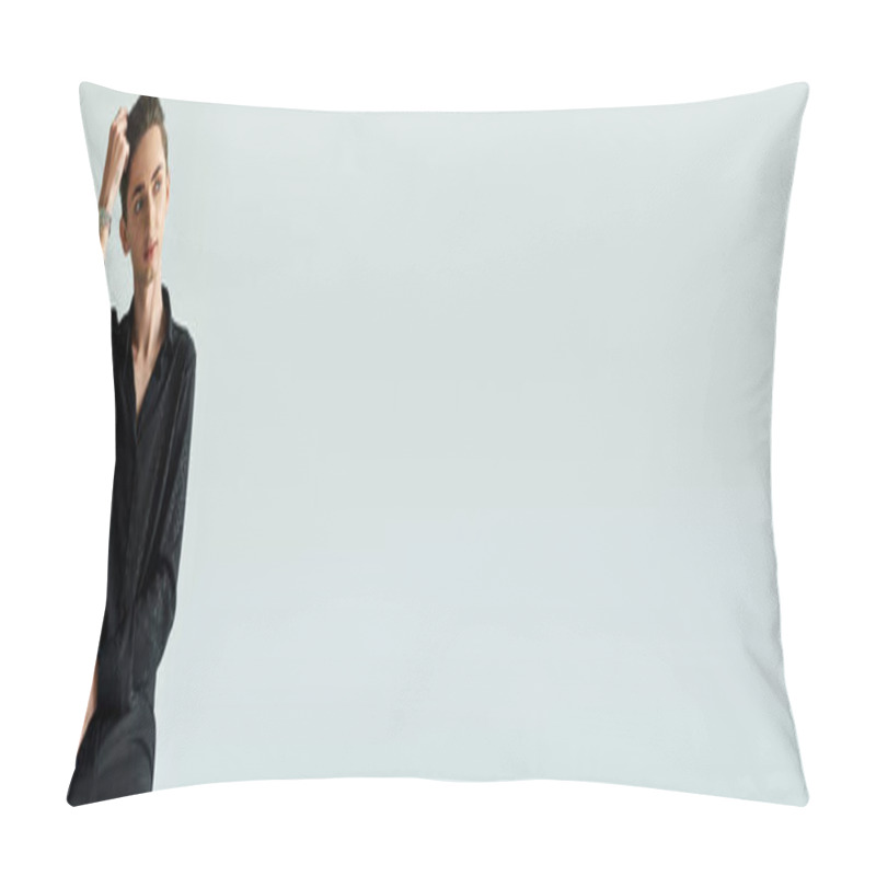 Personality  A Young Queer Man In A Black Shirt Confidently Poses With His Hands On His Head In A Studio Against A Grey Background. Pillow Covers