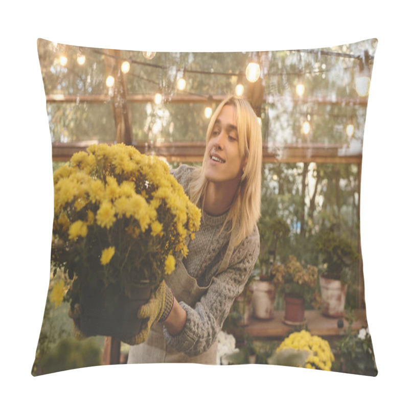 Personality  In A Warmly Lit Greenhouse, A Young And Handsome Man Lovingly Cradles A Pot Of Bright Yellow Flowers. Pillow Covers