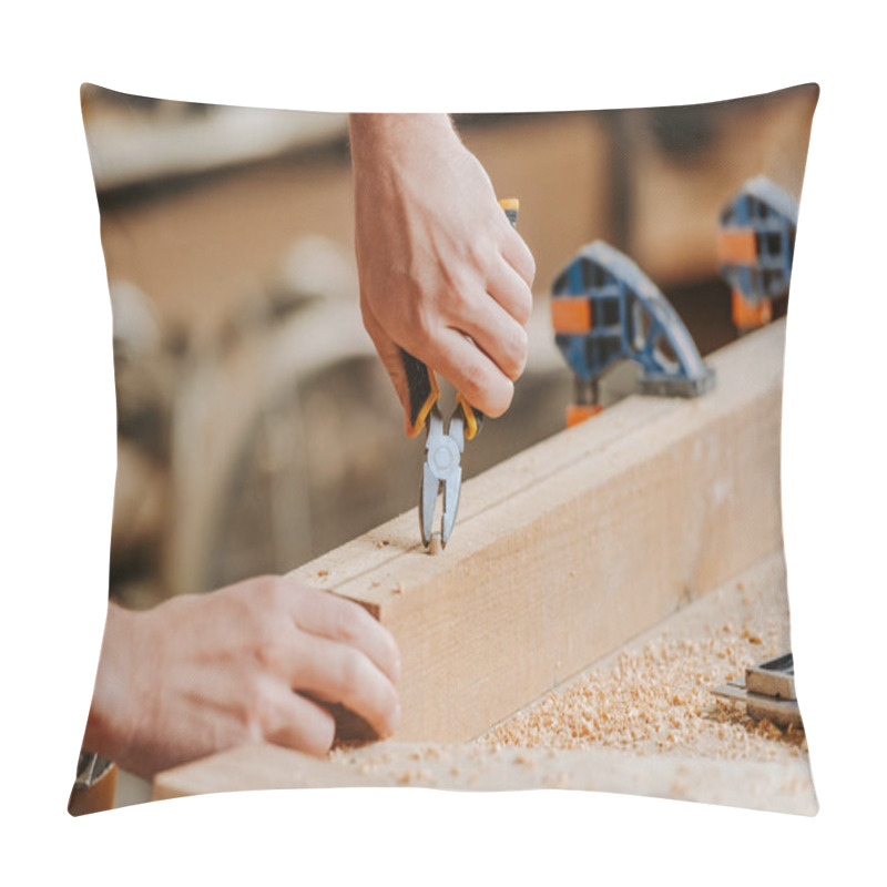 Personality  Cropped View Of Carpenter Holding Pliers Near Wooden Dowel  Pillow Covers