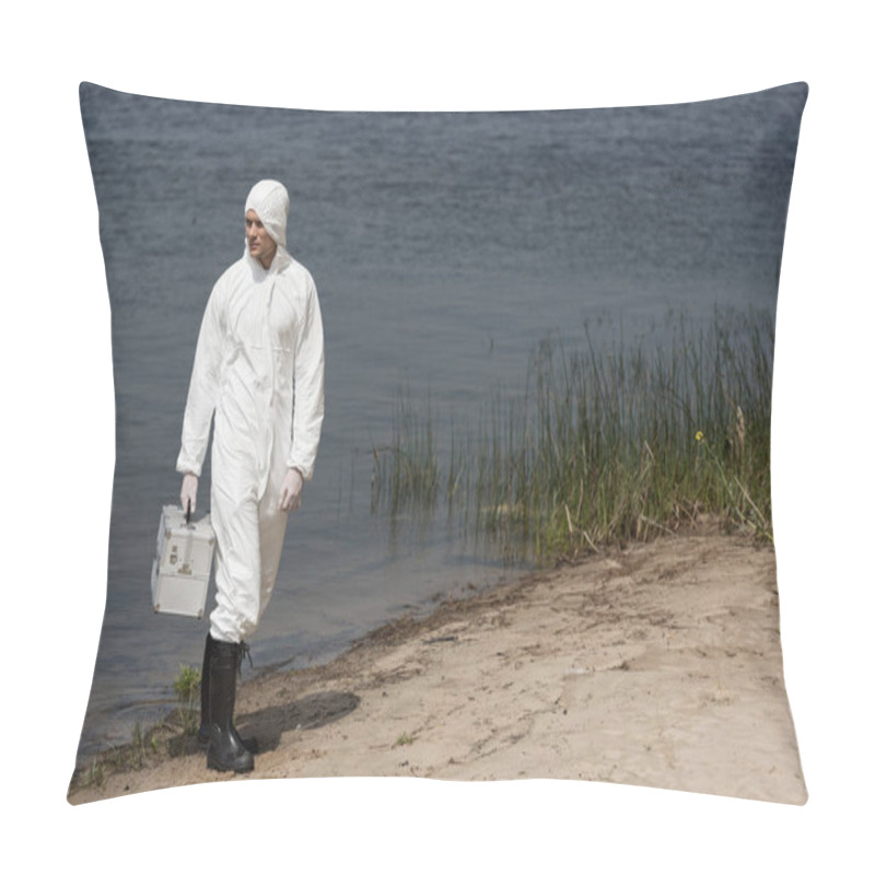 Personality  Full Length View Of Water Inspector In Protective Suit Holding Inspection Kit And Standing On River Coast Pillow Covers