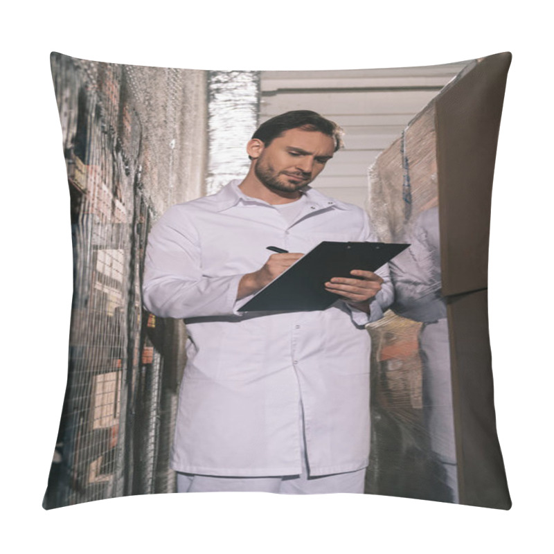 Personality  Focused Storekeeper In White Coat Writing On Clipboard In Warehouse Pillow Covers