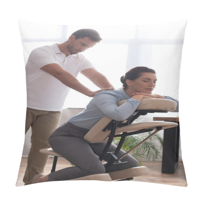 Personality  Masseur With Outstretched Hands Massaging Back Of Smiling Woman With Closed Eyes Sitting On Massage Chair In Office Pillow Covers