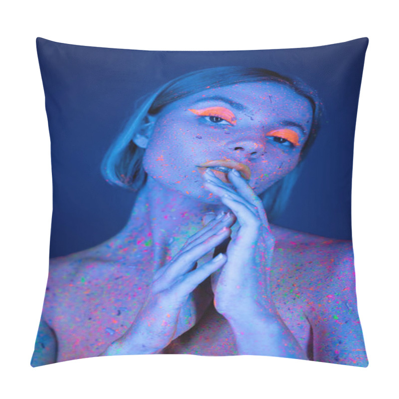 Personality  Nude Woman In Glowing Makeup And Neon Body Paint Holding Hands Near Face Isolated On Dark Blue Pillow Covers