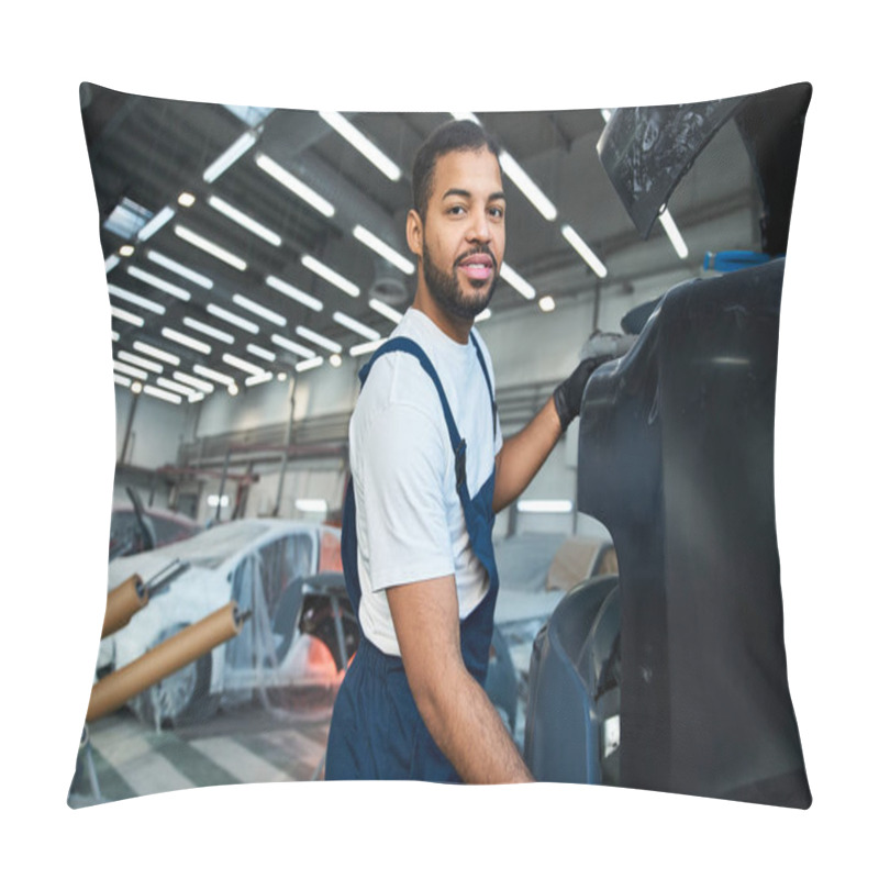 Personality  Handsome Mechanic Focuses On Repairs While Surrounded By Vehicles And Tools In A Busy Workshop Pillow Covers