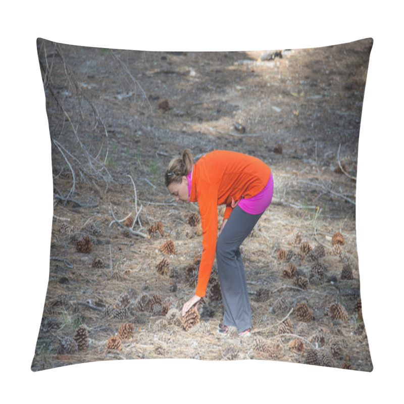 Personality  Adult Woman Bends Over, Picking Up A Large Jeffrey Pine Cone In A Field In Mammoth Lakes California. Pillow Covers