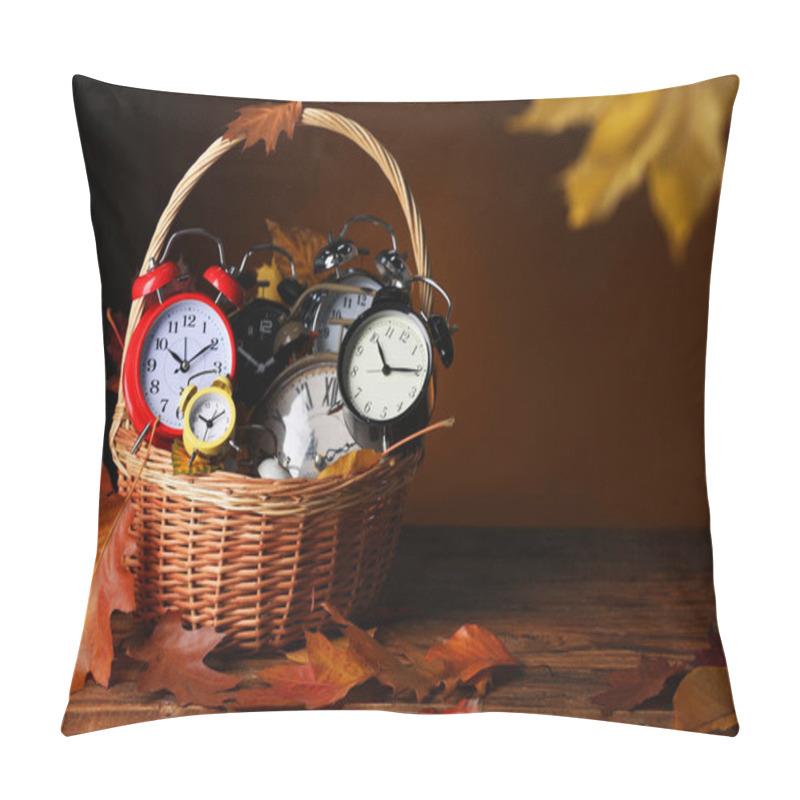 Personality  Alarm Clocks And Dry Leaves In Wicker Basket On Wooden Table Against Brown Background, Space For Text Pillow Covers