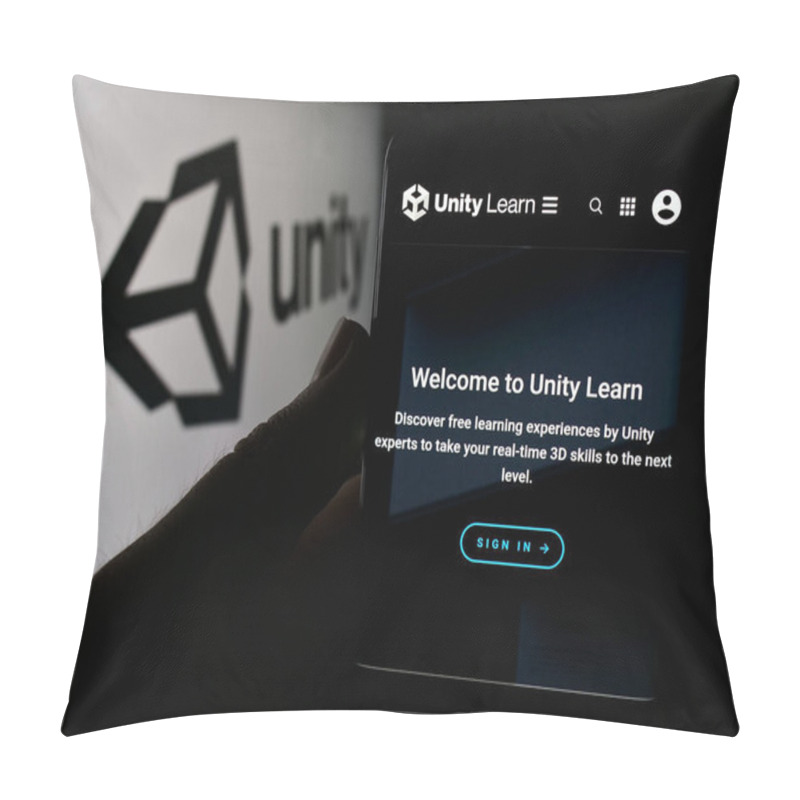 Personality  Stuttgart, Germany - 08-09-2024: Person Holding Smartphone With Website Of US Video Games Company Unity Software Inc. In Front Of Logo. Focus On Center Of Phone Display. Pillow Covers