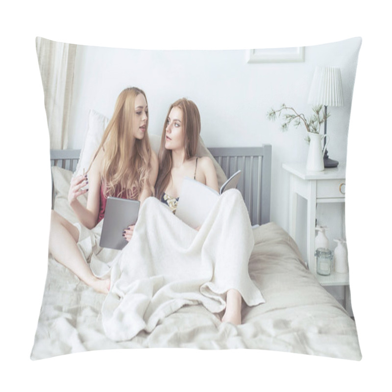 Personality  Two Sexy Blonde Girls In Pyjamas Having Fun In The Bedroom. Young Females Lying In Bed Using Tablet. Pillow Covers