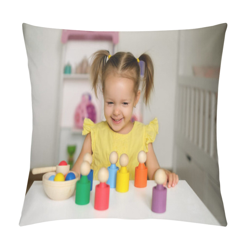 Personality  A Two-year-old Girl With Ponytails Is Sitting At A Table With Developmental Toys And Laughing Merrily. Bright Colorful Toys Stand In Front Of The Child. Baby Is Happy To Learn Colors Pillow Covers