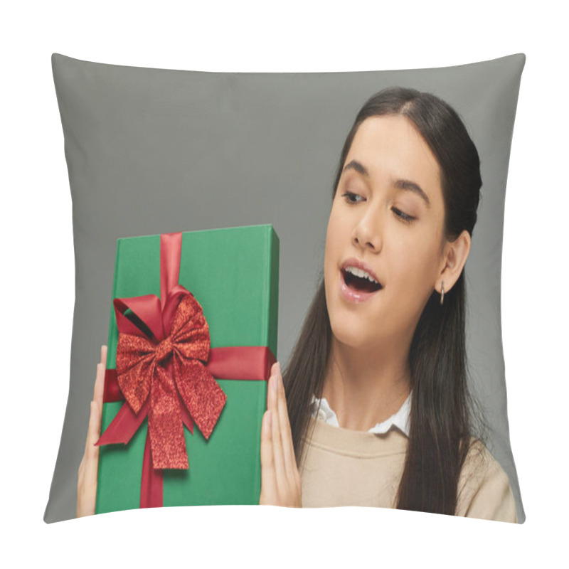 Personality  The Woman Displays Delight As She Holds A Beautifully Wrapped Present Adorned With A Bow. Pillow Covers