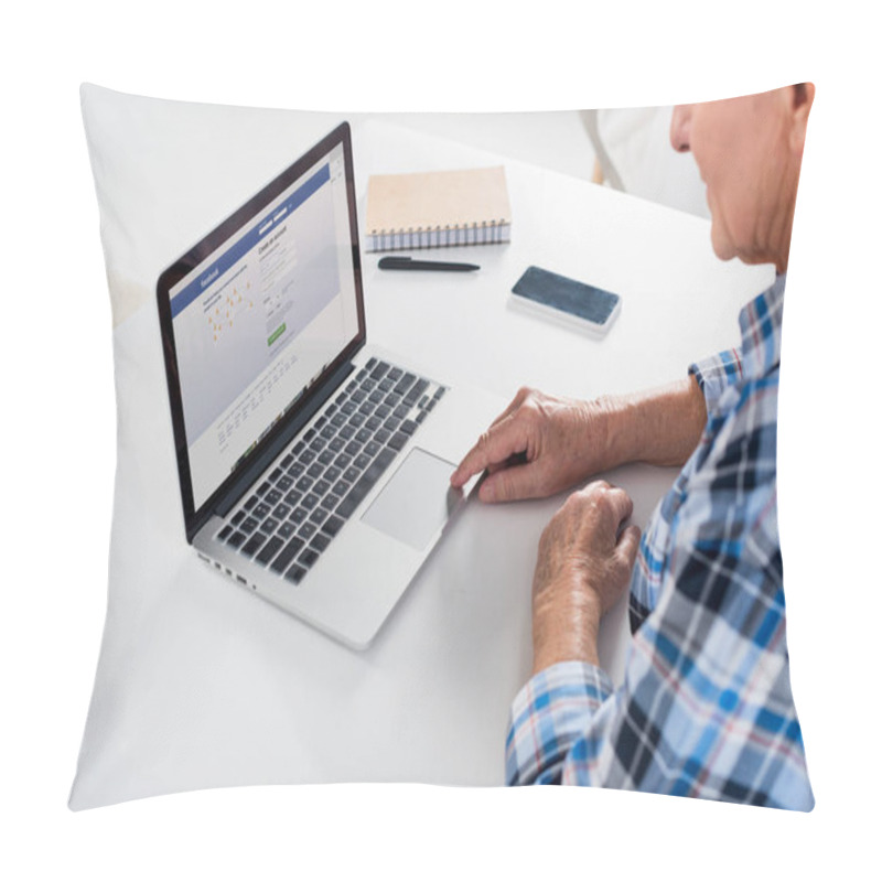 Personality  Partial View Of Senior Man Working On Laptop With Facebook Logo At Table With Notebook At Home Pillow Covers