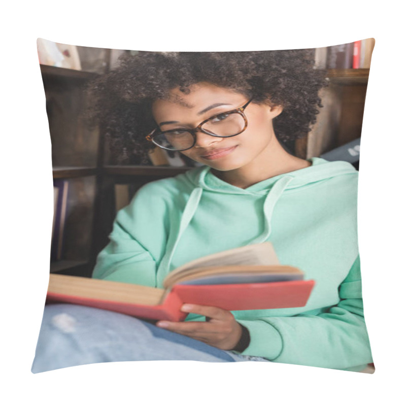 Personality  Young African American Student In Eyeglasses Holding Book In Library  Pillow Covers