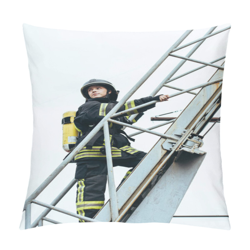 Personality  Female Firefighter In Protective Uniform And Helmet With Fire Extinguisher On Back Standing On Ladder With Blue Sky On Background Pillow Covers