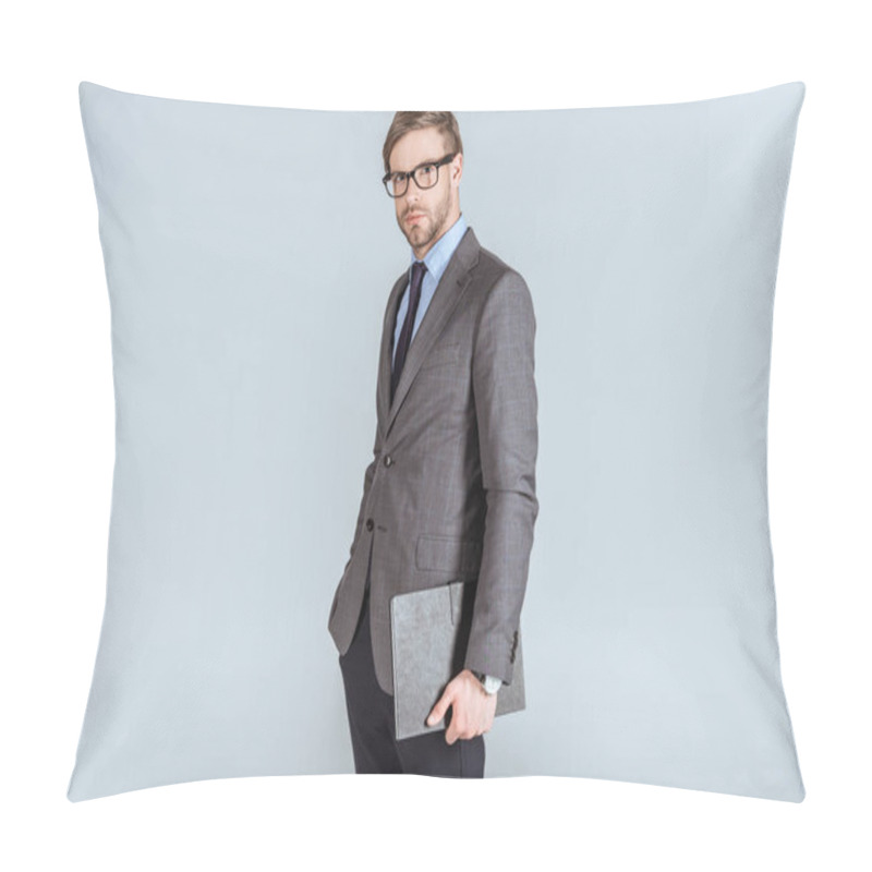 Personality  Young Serious Businessman Holding Notebook Isolated On Grey Pillow Covers