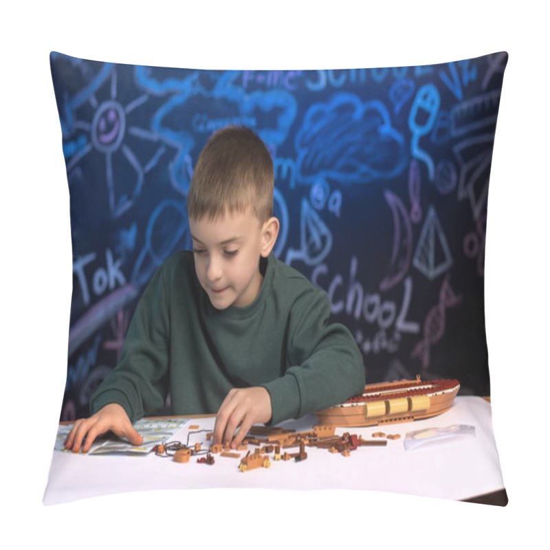 Personality  Boy Working On A Model Ship With An Instructional Manual, Engaging In A Hands-on Activity That Encourages Learning, Focus, And Patience. Pillow Covers