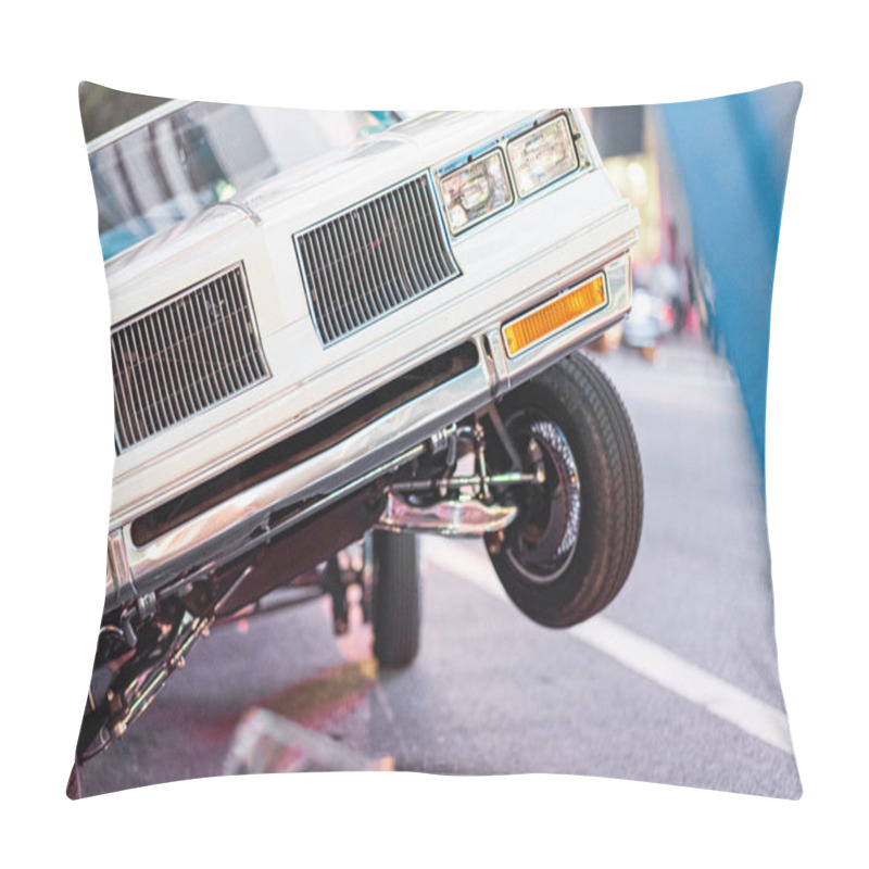 Personality  A Classic American Car Dramatically Leaning On A City Street, Highlighting Its Hydraulic System And Vintage Appeal. The Urban Lights In The Background Add A Sense Of Excitement And Style. Pillow Covers