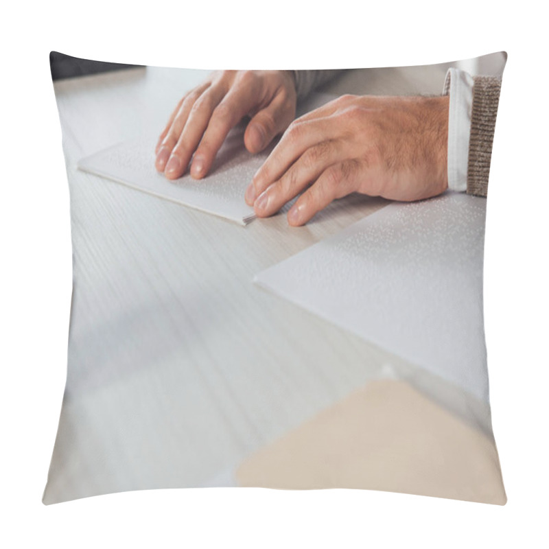 Personality  Cropped View Of Blind Man Reading Braille Font From Paper At Table Pillow Covers