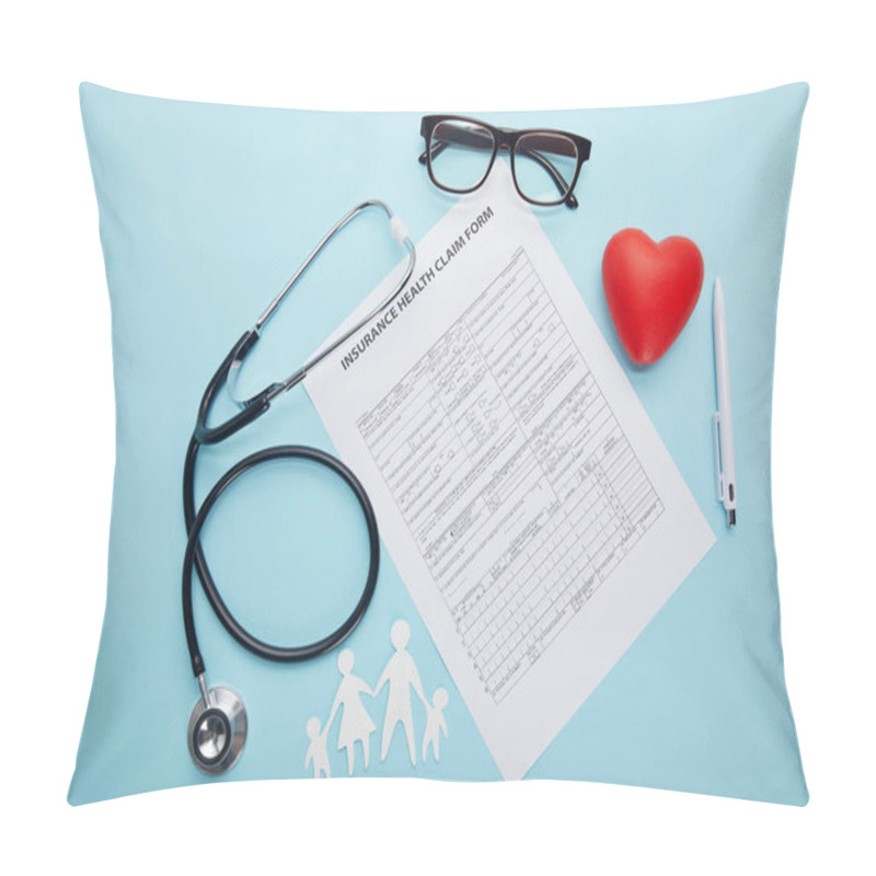 Personality  Top View Of Insurance Health Claim Form, Eyeglasses, Paper Cut Family, Red Heart Symbol And Stethoscope On Blue  Pillow Covers