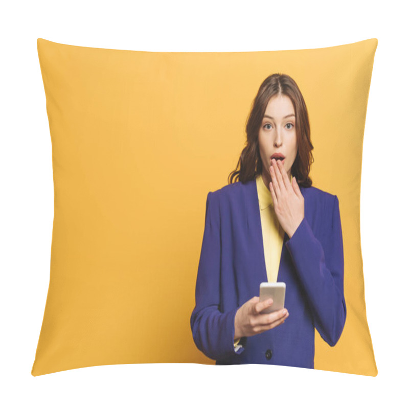 Personality  Shocked Girl Covering Mouth With Hand While Holding Smartphone On Yellow Background Pillow Covers