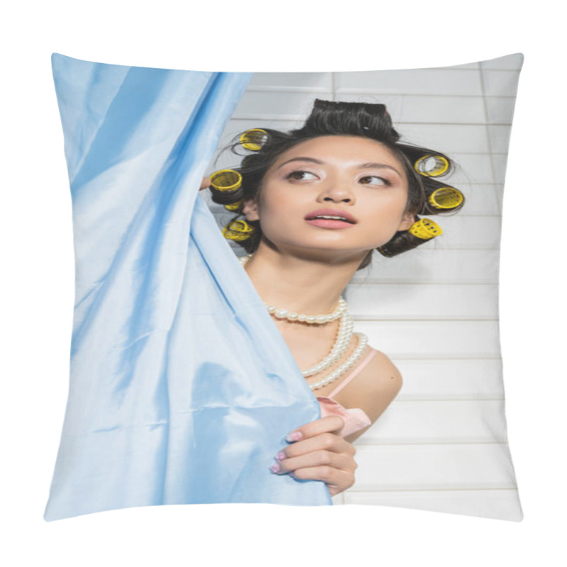 Personality  Curious And Asian Young Woman With Hair Curlers Standing In Pearl Necklace Behind Blue Bathroom Curtain And Looking Away Near White Tiles At Home, Housewife, Domestic Scene  Pillow Covers