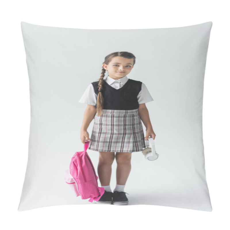 Personality  Full Length Of Schoolgirl In Uniform Standing With Backpack And Holding Wireless Headphones On Grey Pillow Covers