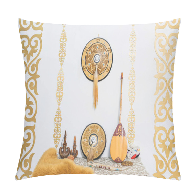 Personality  Gold Ornaments On The White Walls. Sheep Skin Decorative. A Two-stringed Kazakh National Musical Instrument Dombra. Leather Container For Storing Drinks. Kazakh Medieval Shield. Pillow Covers