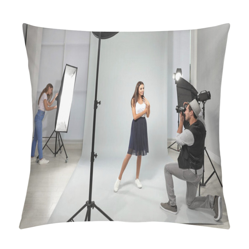 Personality  Professional Photographer With Assistant Taking Picture Of Young Woman In Modern Studio Pillow Covers