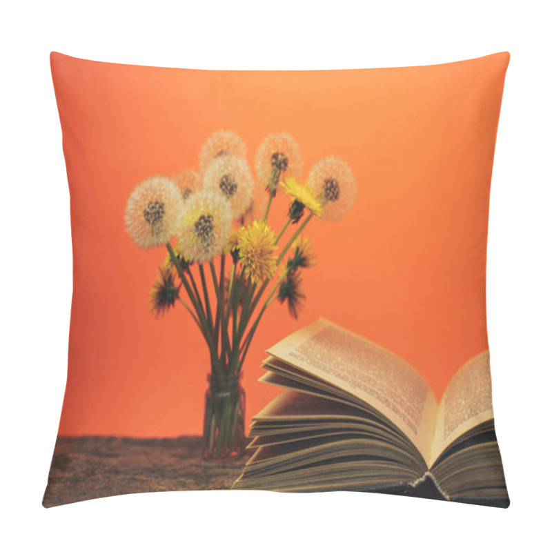 Personality  Open Book And  Yellow Flower Dandelion On A Old Oak Table And Coral Orange  Wall Background. Pillow Covers