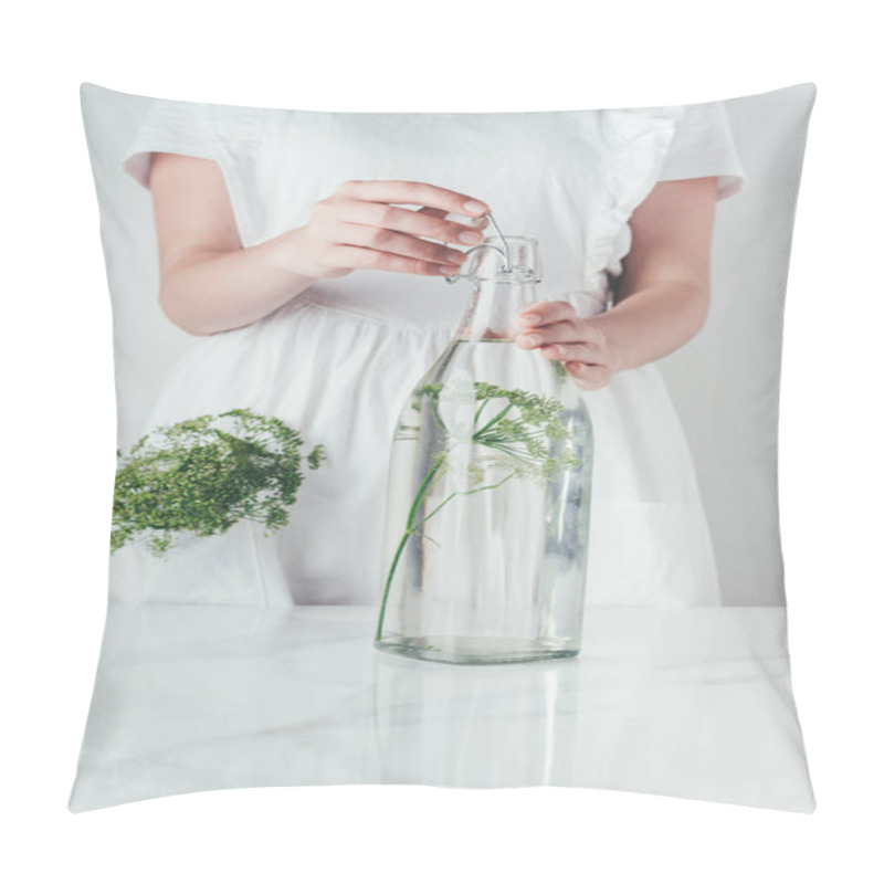 Personality  Cropped Image Of Woman Closing Glass Bottle With Water And Dill At Kitchen Pillow Covers